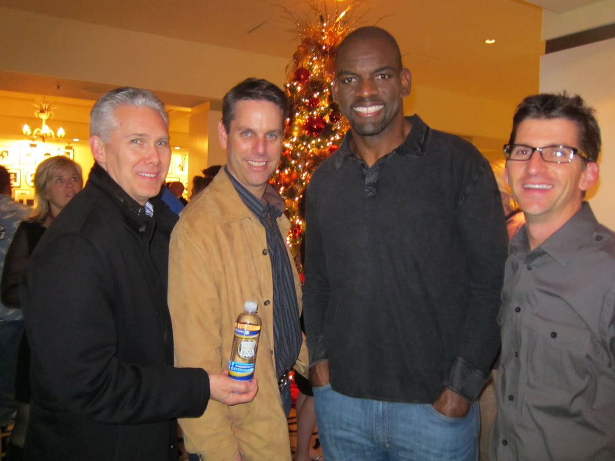 Derek with cast members on The Biggest Loser
